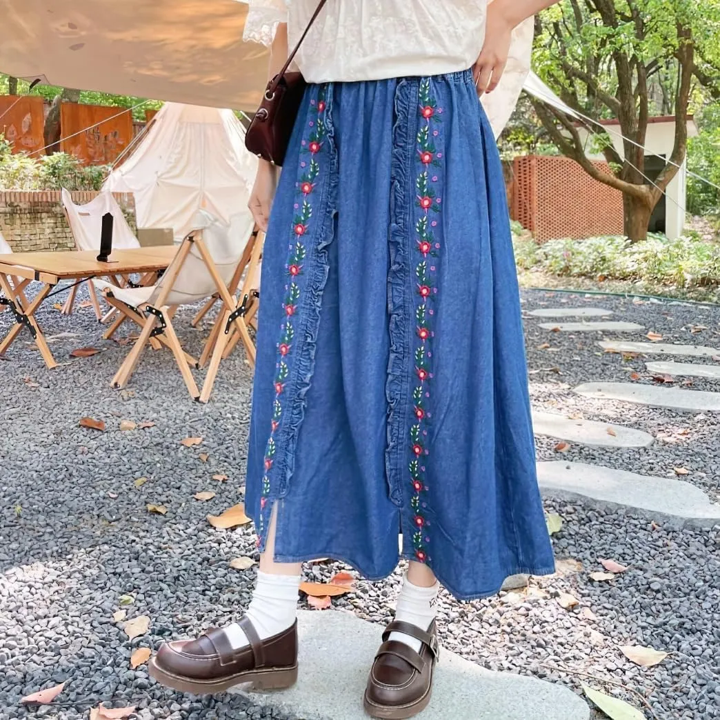 chouyatou Women's Floral Embroidered Elastic Waist Jean Skirt A Line Flared Denim Midi Skirt with Pockets