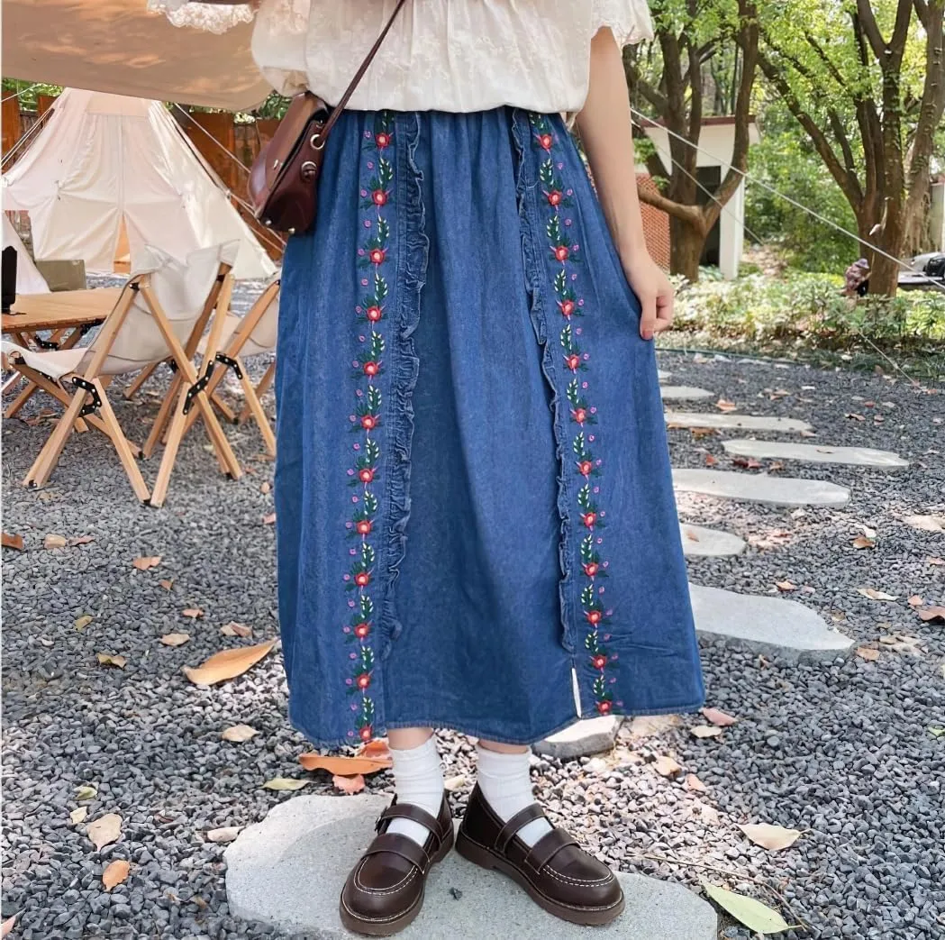 chouyatou Women's Floral Embroidered Elastic Waist Jean Skirt A Line Flared Denim Midi Skirt with Pockets